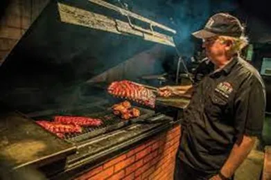 Man Barbequing in Lockhart