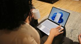 Woman looking at laptop screen